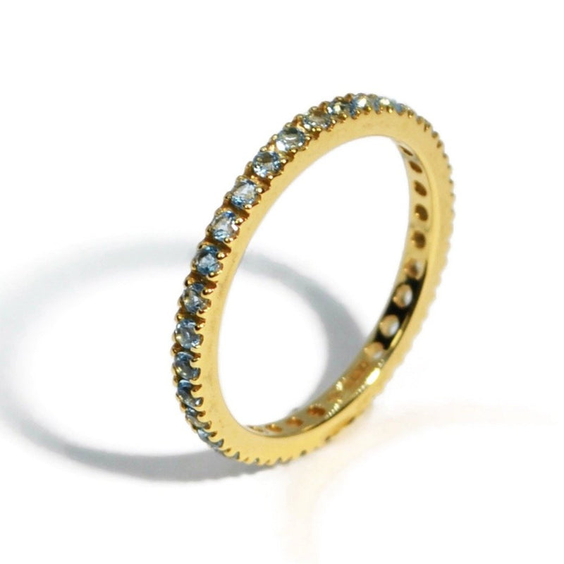 France Eternity Band Ring with Blue Topaz all around, French-set, 18k Yellow Gold