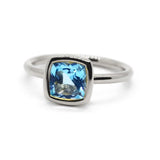 Gaia - Small Stackable Ring with Swiss Blue Topaz, 18k White Gold