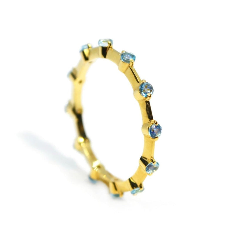 Band Ring with Blue Topaz, 18k Yellow Gold